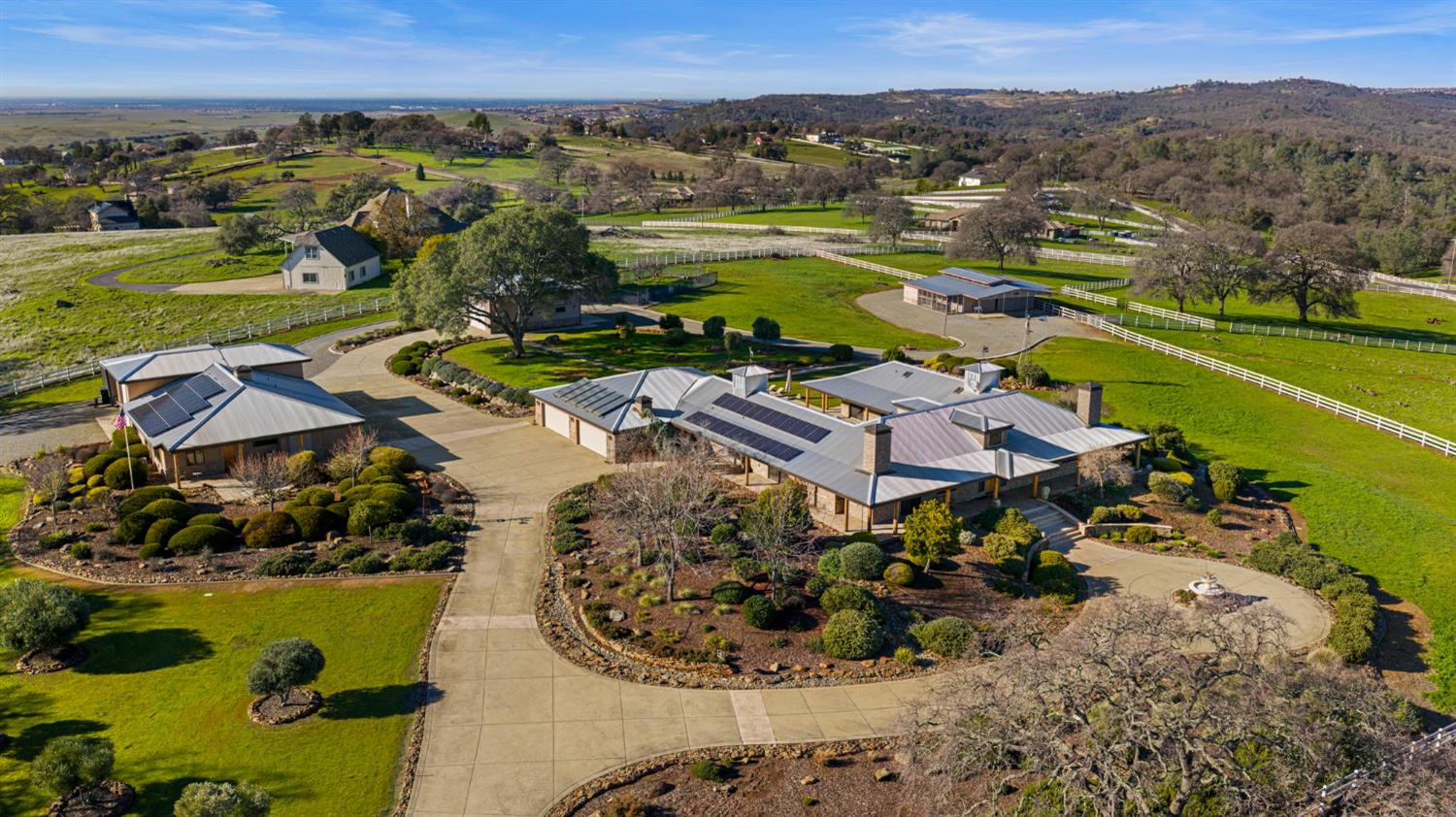 5630 Grazing Hill Road Shingle Springs, CA 95682 - Photo 2 of 86 an aerial view of residential houses with outdoor space and river