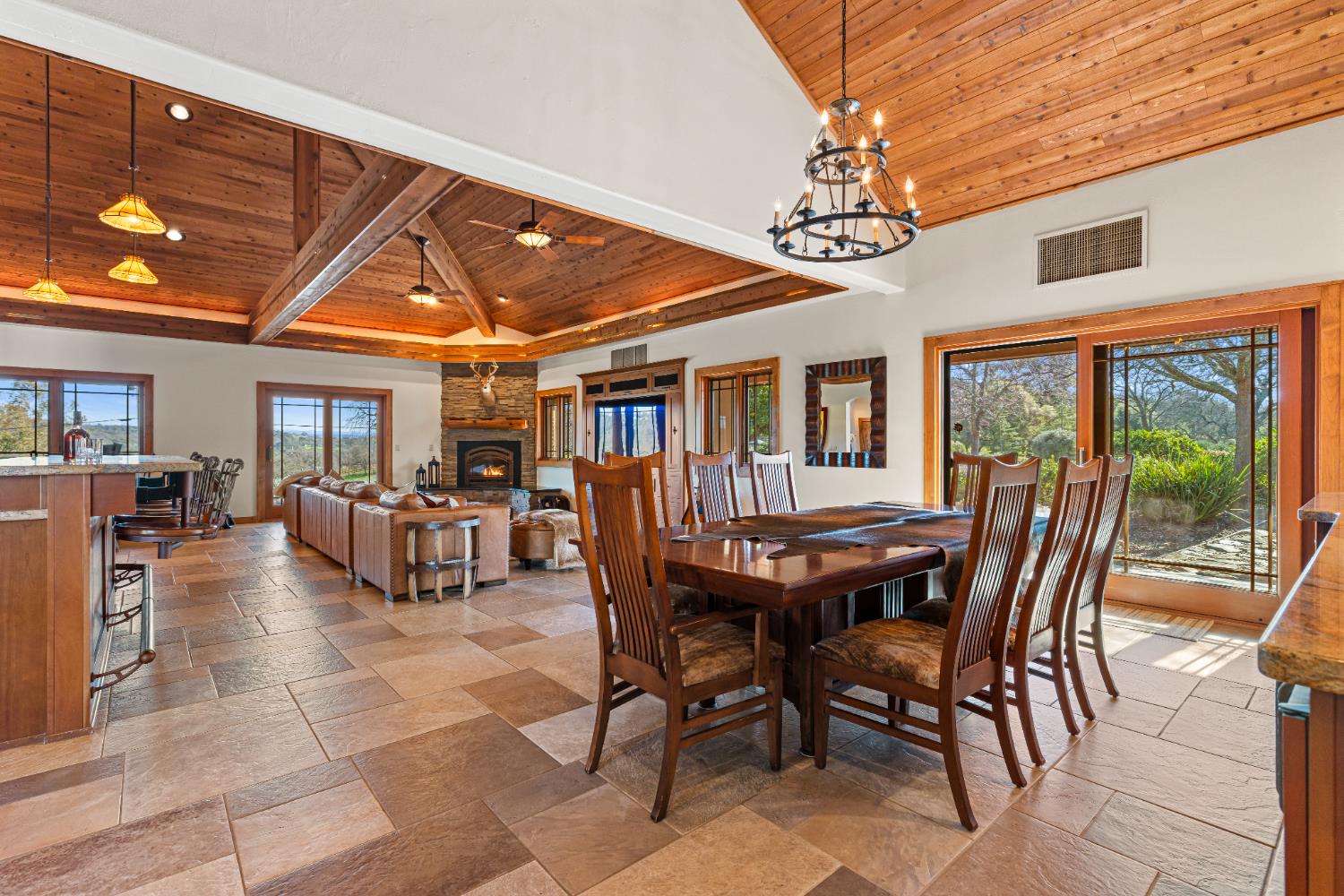 5630 Grazing Hill Road Shingle Springs, CA 95682 - Photo 37 of 86 a view of a dining room with furniture window and outside view
