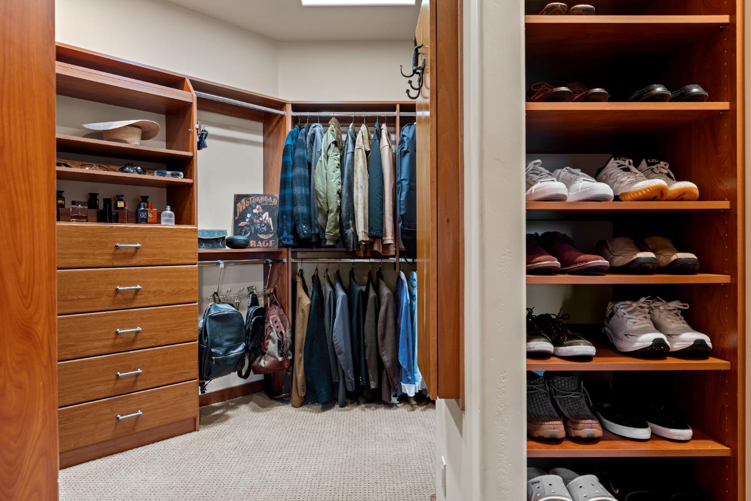 5630 Grazing Hill Road Shingle Springs, CA 95682 - Photo 49 of 86 a view of walk in closet with clothes and shoes