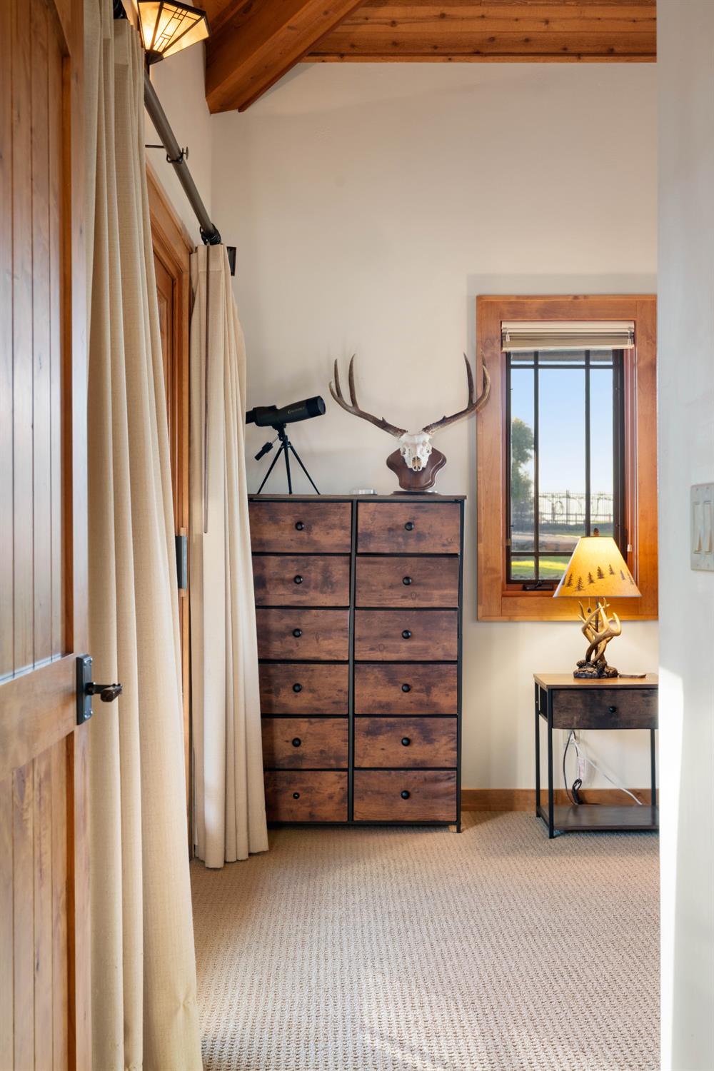 5630 Grazing Hill Road Shingle Springs, CA 95682 - Photo 53 of 86 a bedroom with a bed and a window