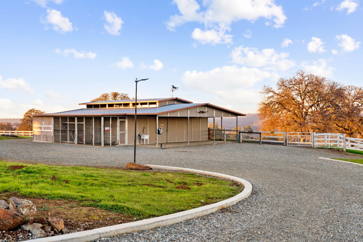 5630 Grazing Hill Road Shingle Springs, CA 95682 - Photo 63 of 86 a view of a house with a backyard and plants