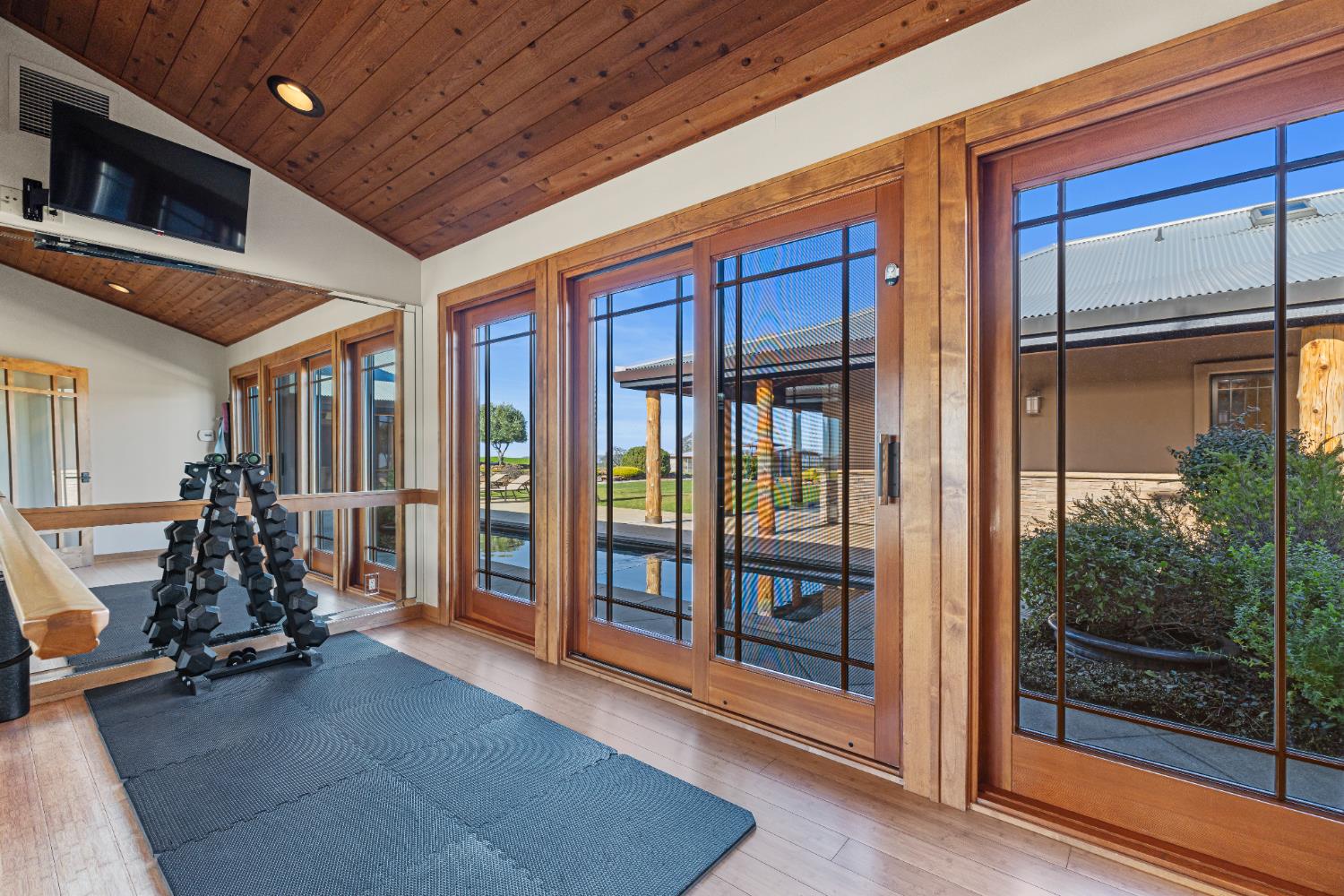 5630 Grazing Hill Road Shingle Springs, CA 95682 - Photo 76 of 86 a view of a room with gym equipment