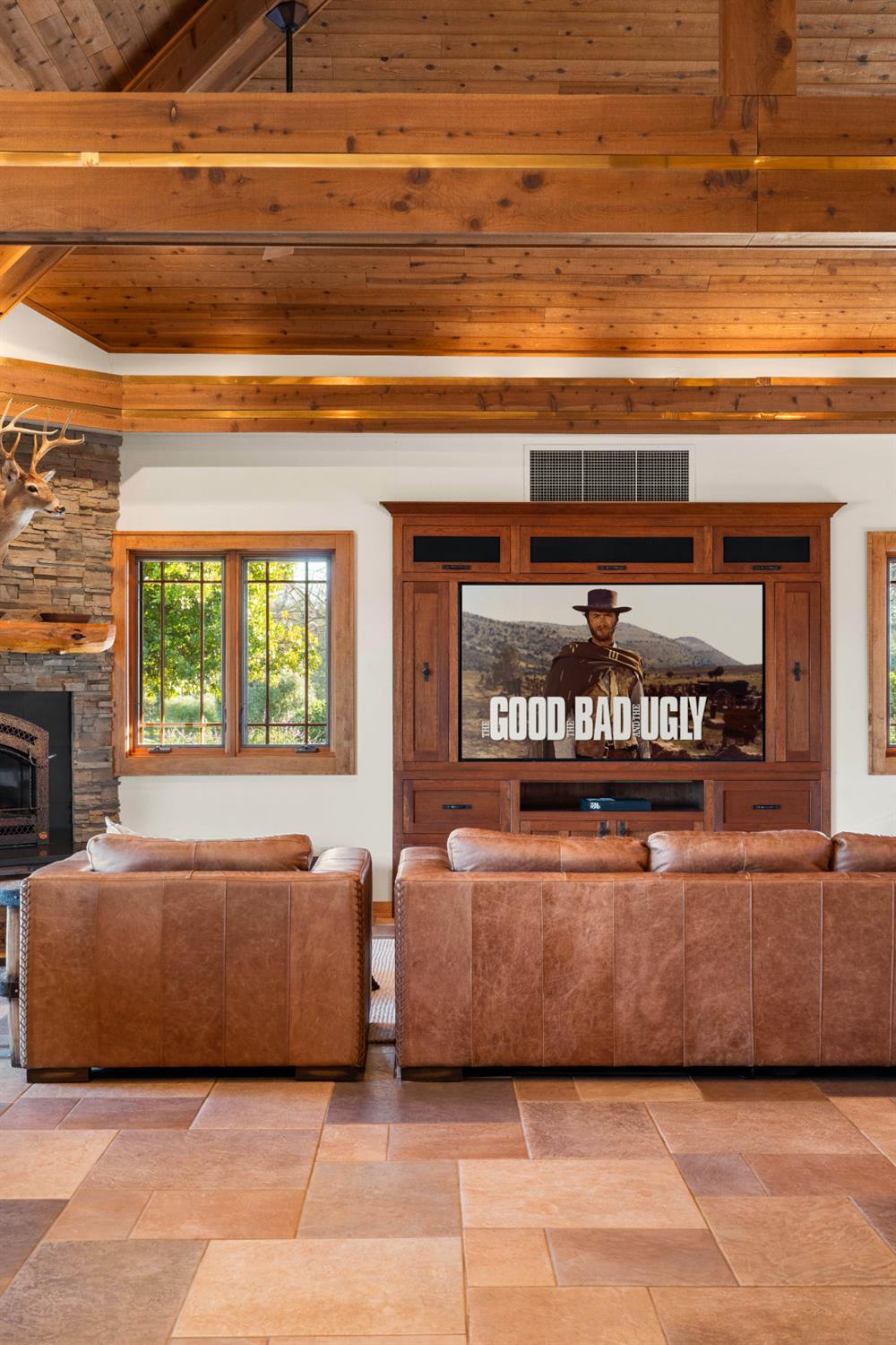 5630 Grazing Hill Road Shingle Springs, CA 95682 - Photo 10 of 86 a living room with a couch and a fireplace