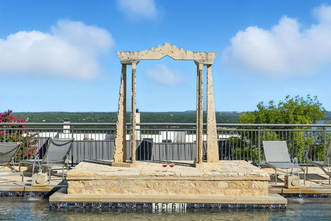 2918 Ranch Road 620 North, Unit L176 Austin, TX 78734 - Photo 32 of 35 Dock with a water view and a patio area