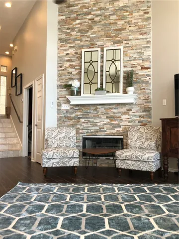a view of a fireplace with wooden floor