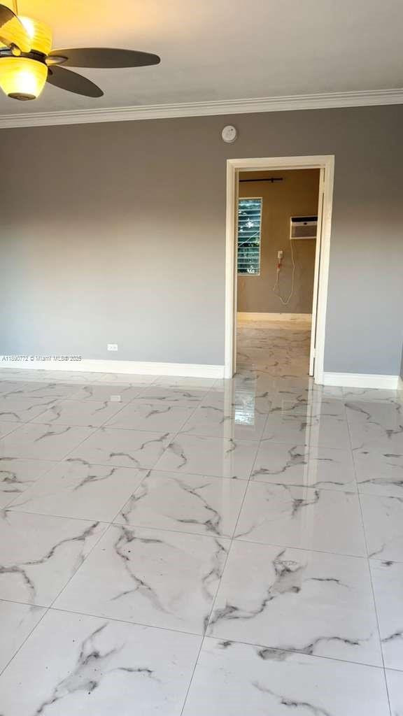 346 86th Street, Unit 2 Miami Beach, FL 33141 - Photo 5 of 13 wooden floor in a empty room