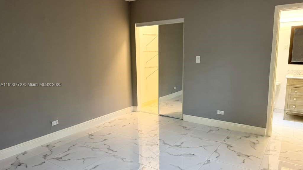 346 86th Street, Unit 2 Miami Beach, FL 33141 - Photo 8 of 13 a view of an empty room