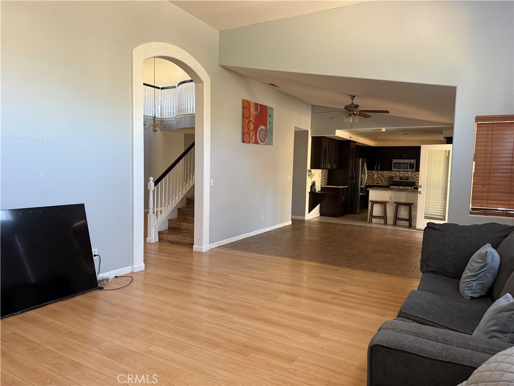 30456 Avenida Caylee Homeland, CA 92548 - Photo 14 of 27 a living room with furniture and a flat screen tv