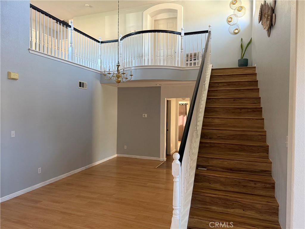 30456 Avenida Caylee Homeland, CA 92548 - Photo 15 of 27 a view of entryway and hall with wooden floor