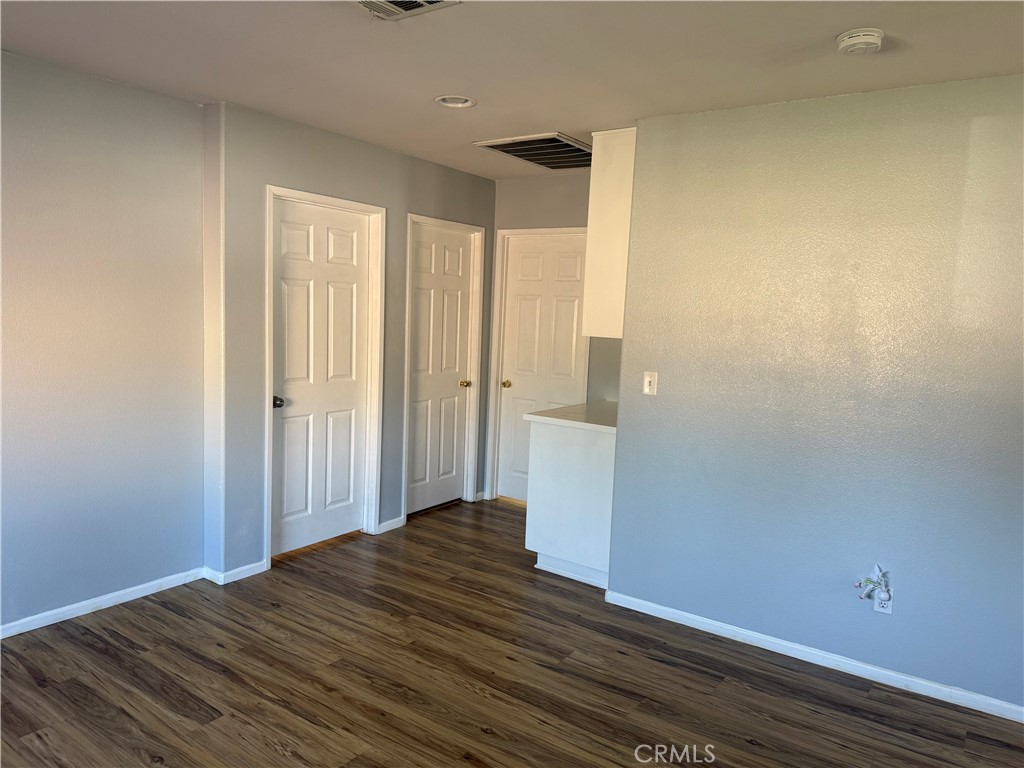 30456 Avenida Caylee Homeland, CA 92548 - Photo 20 of 27 a view of a bathroom with wooden floor