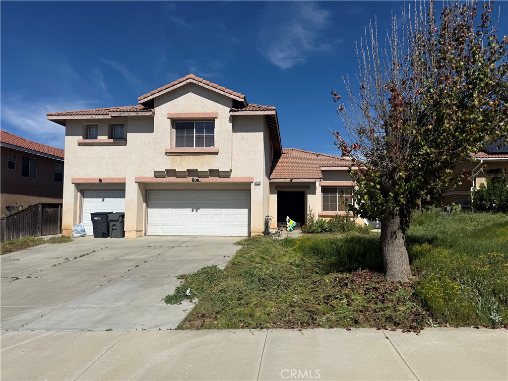 30456 Avenida Caylee Homeland, CA 92548 - Photo 2 of 27 a front view of a house with a yard