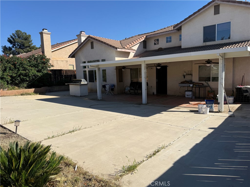 30456 Avenida Caylee Homeland, CA 92548 - Photo 25 of 27 a view of a house with a patio