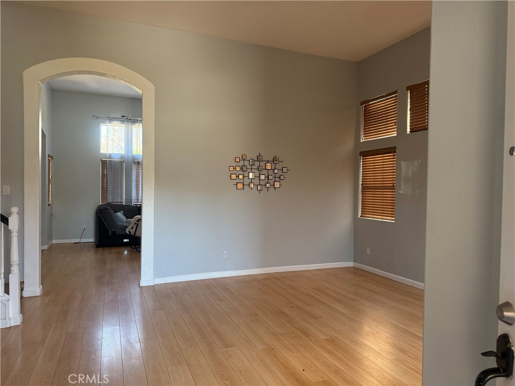 30456 Avenida Caylee Homeland, CA 92548 - Photo 4 of 27 a view of a livingroom with wooden floor