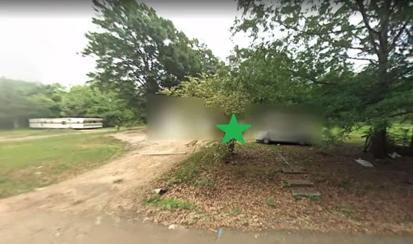 a view of a house and a street view