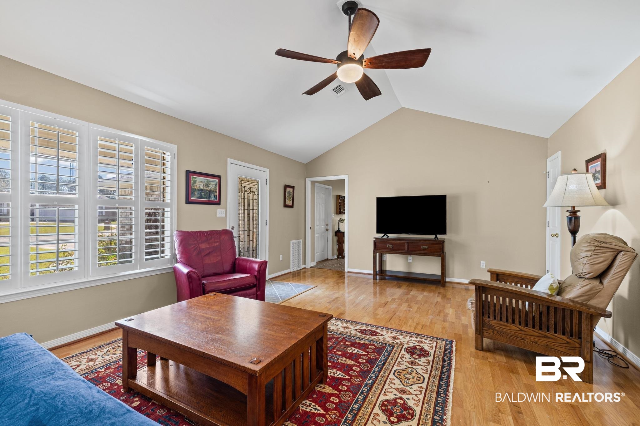 2881 Eslava Circle Lillian, AL 36549 - Photo 5 of 58 Living area with light wood-style flooring and ceiling fan