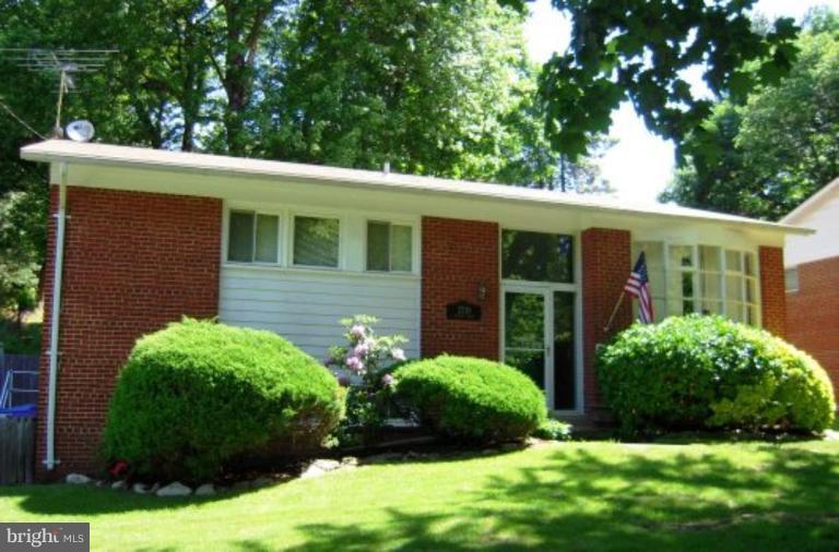 3719 Astoria Road Kensington, MD 20895 - Photo 1 of 19 a view of a house with a garden