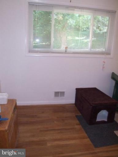 3719 Astoria Road Kensington, MD 20895 - Photo 4 of 19 a room with a bed and a window
