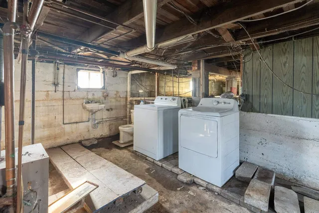 a storage room with washer and dryer