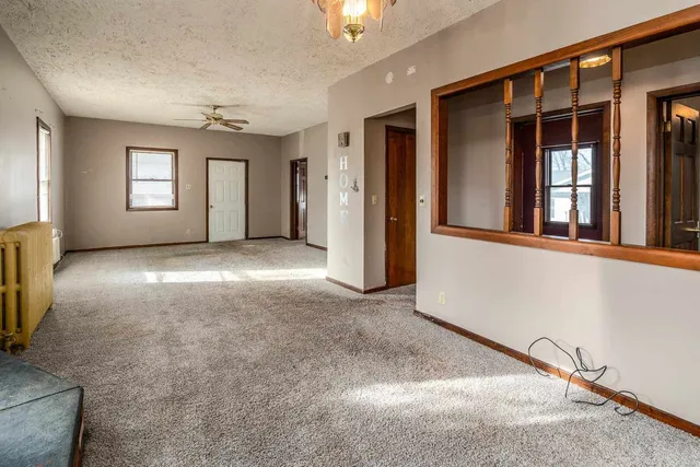 an empty room with windows