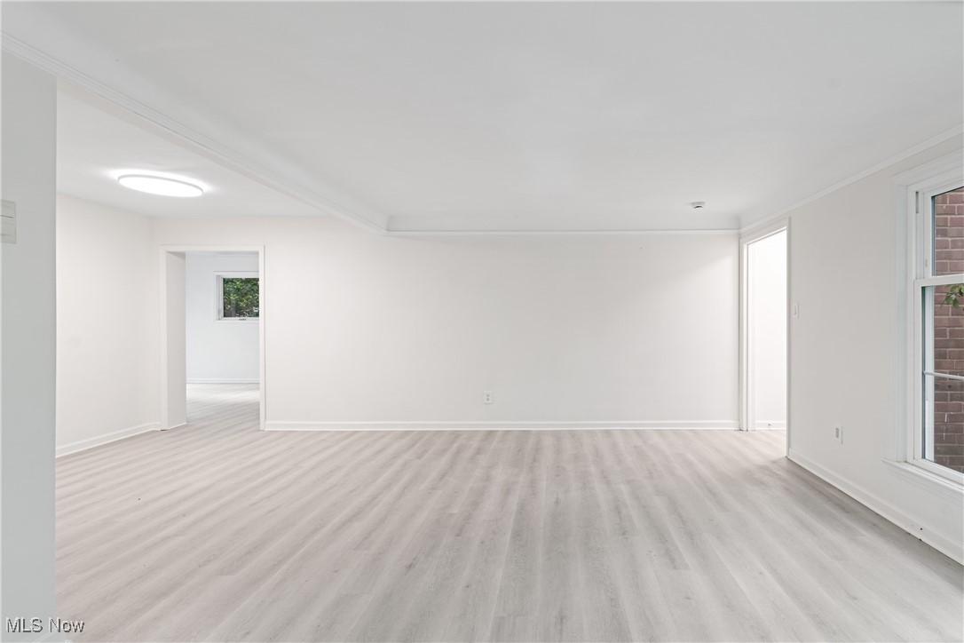1057 Renfield Road Cleveland Heights, OH 44121 - Photo 5 of 30 Unfurnished room featuring light hardwood / wood-style floors
