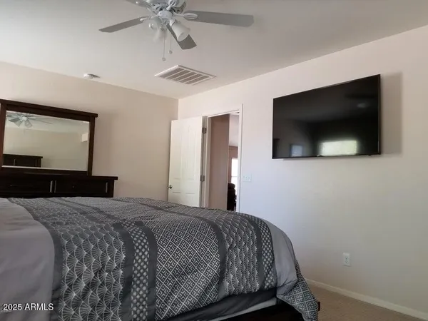 a bathroom with a sink toilet and a mirror