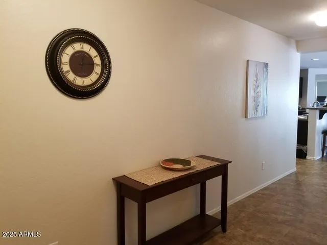 a kitchen with a sink a stove and cabinets