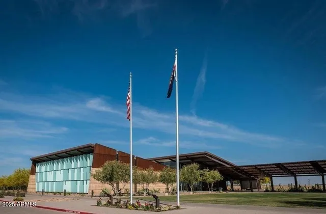 a view of a swimming pool with a patio