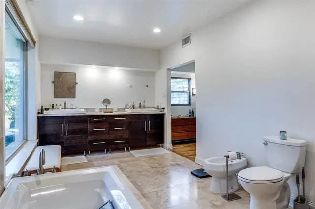 a bathroom with a sink and a toilet