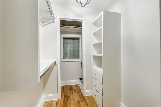 a view of a kitchen from the hallway