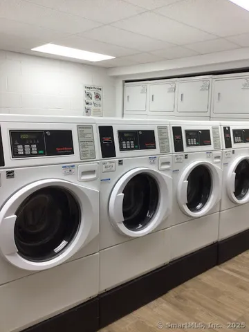 a view of gym equipment and a living room