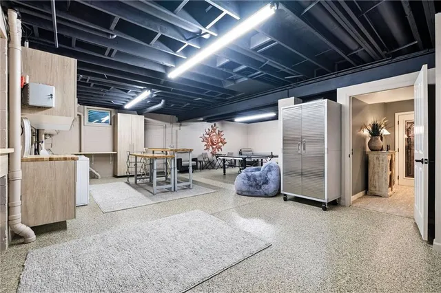 a view of a garage with wooden floor
