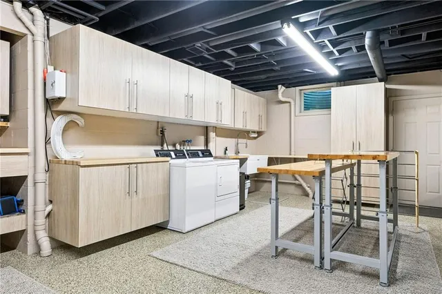 a view of a kitchen with electric appliances