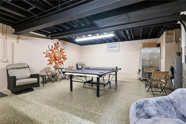 a living room with furniture and a table