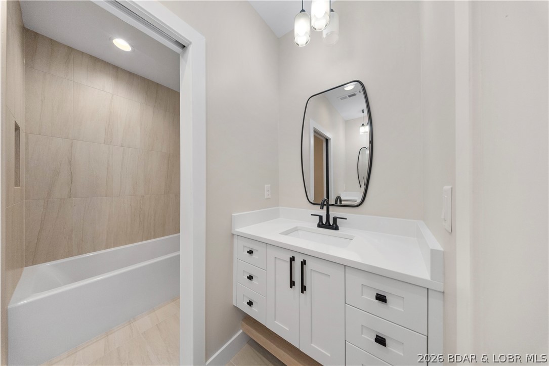 439 Red Bud Road Lake Ozark, MO 65049 - Photo 63 of 98 Beautifully designed bathroom featuring custom cab