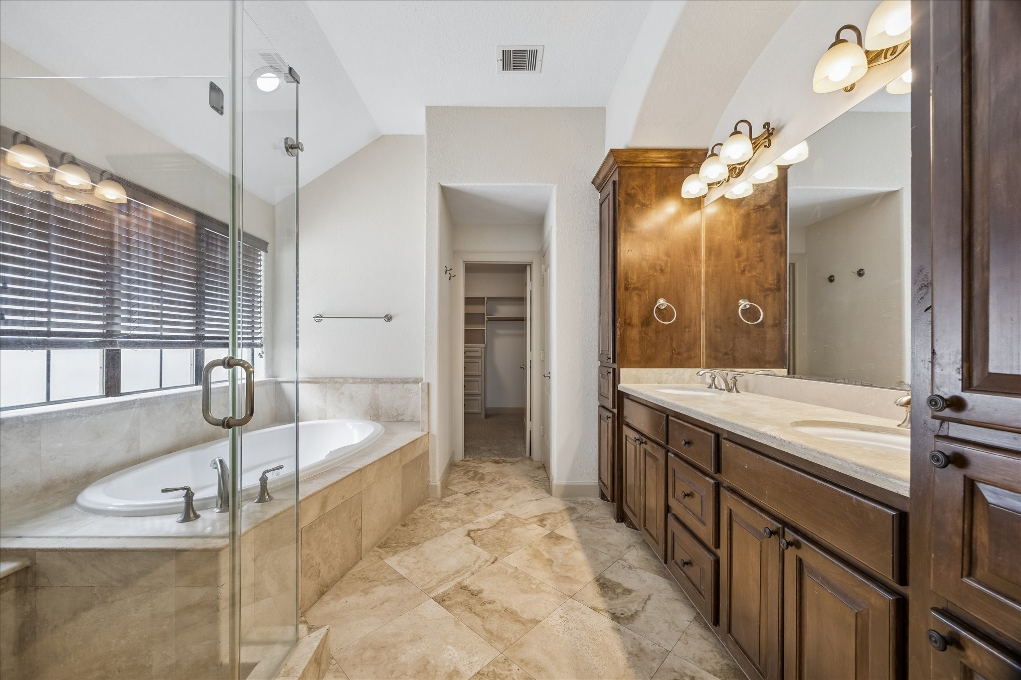 4301 Gibson Street Houston, TX 77007 - Photo 17 of 24 Primary bathroom features large bathtub, separate shower, double sinks, tons of built-in storage and a large closet.