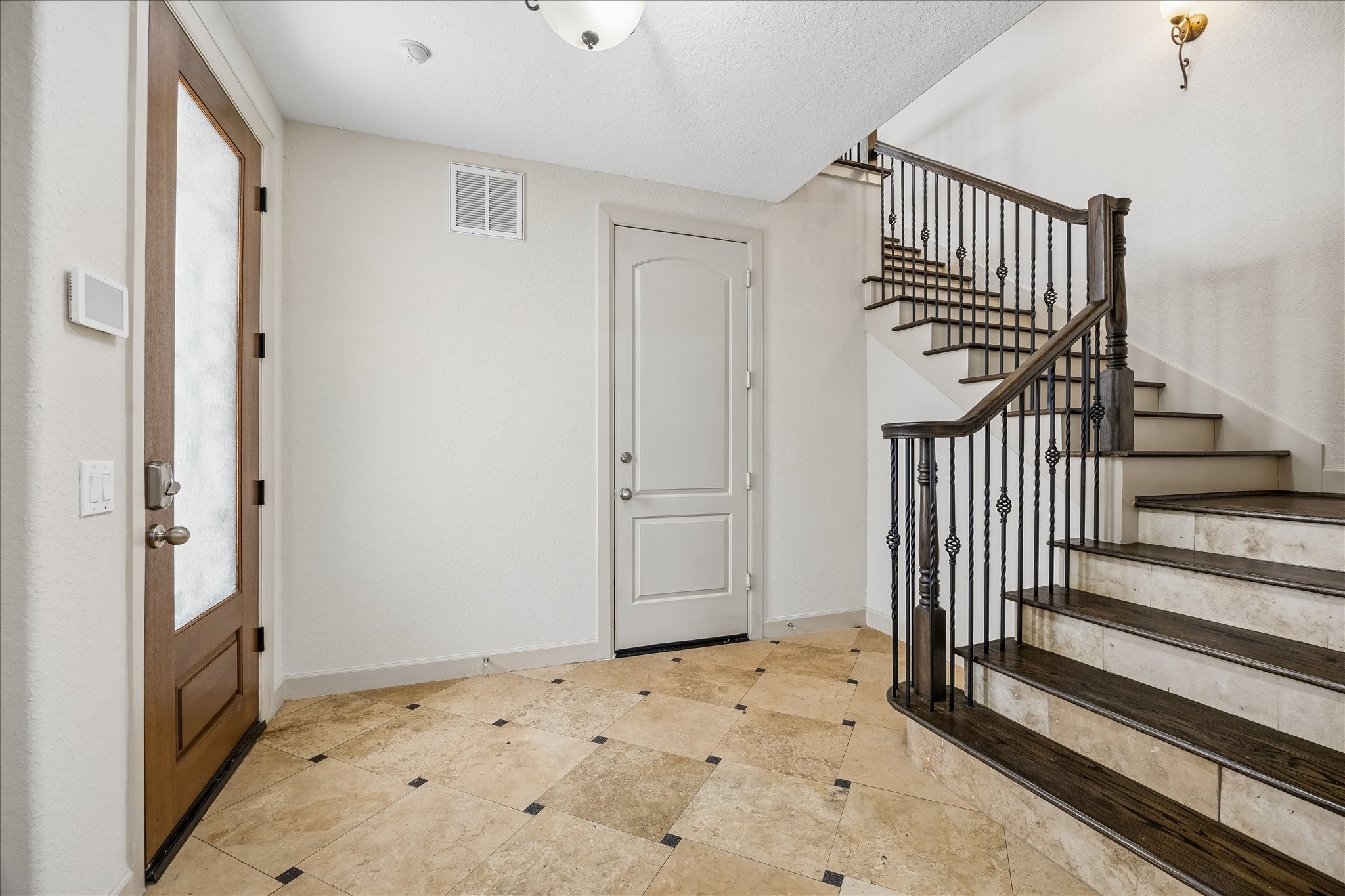 4301 Gibson Street Houston, TX 77007 - Photo 2 of 24 1st floor features a large entry foyer and a spacious bedroom/office or flex space.