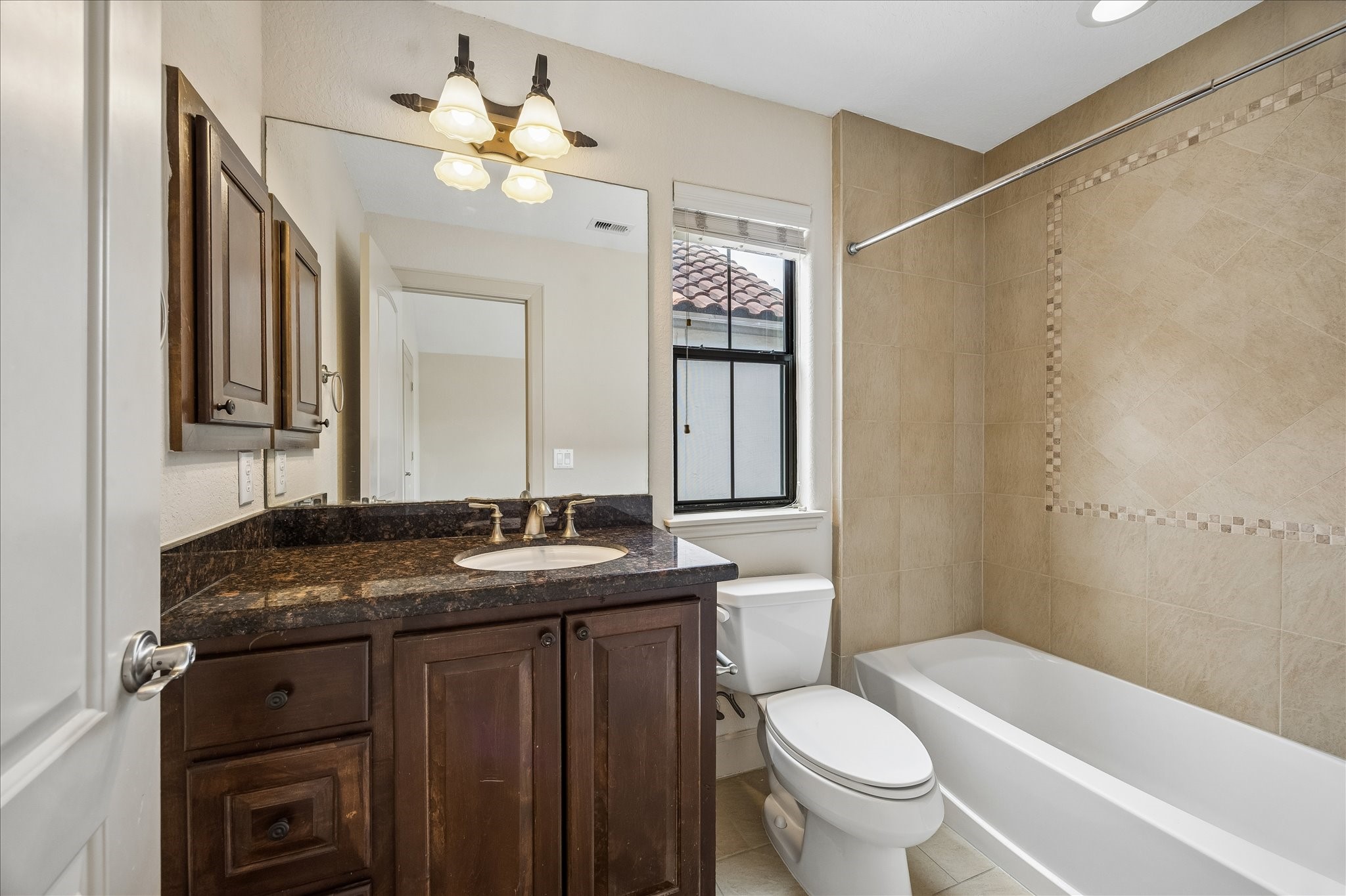 4301 Gibson Street Houston, TX 77007 - Photo 21 of 24 Ensuite bathroom off of secondary bedroom on third floor.