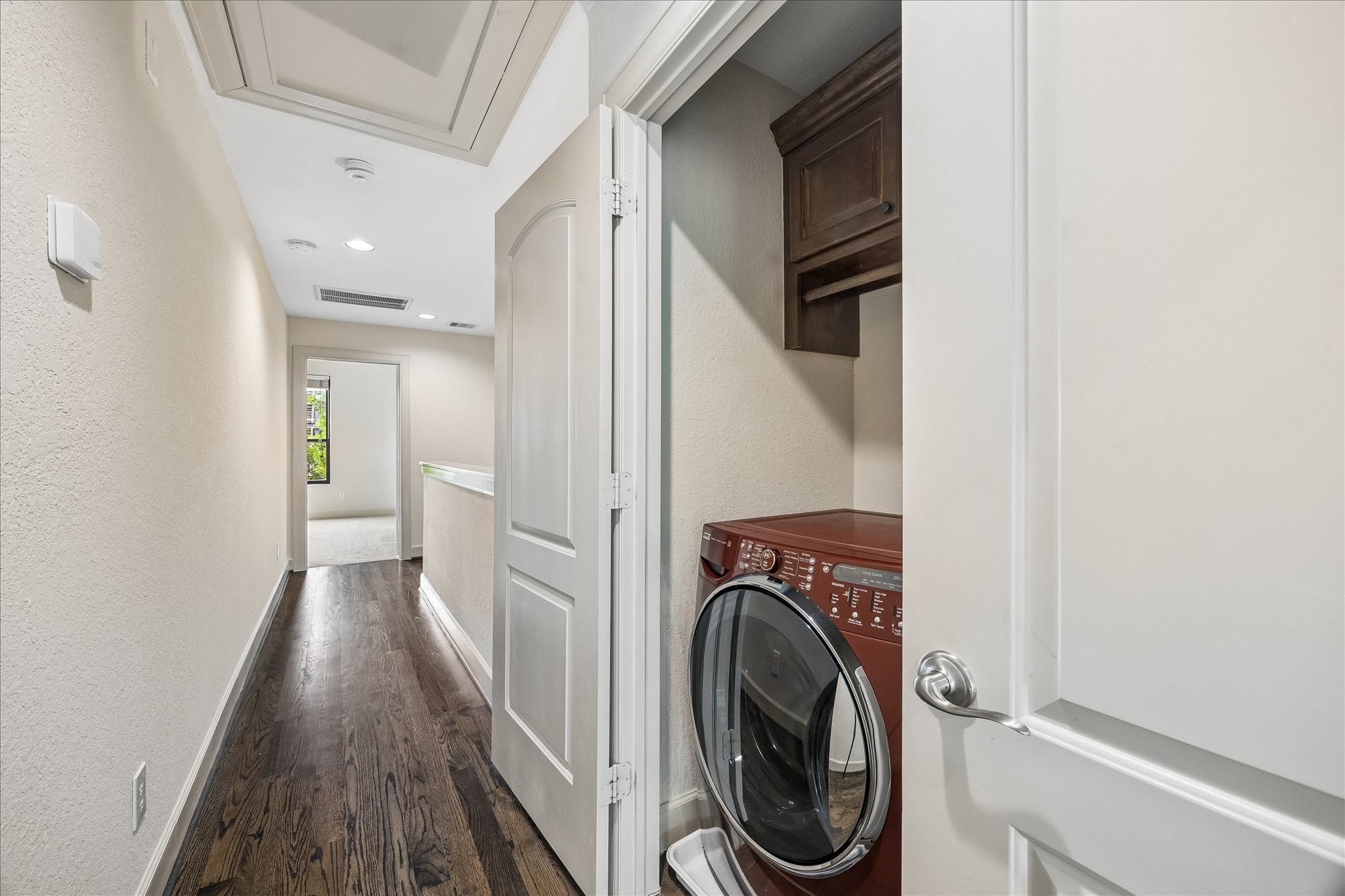 4301 Gibson Street Houston, TX 77007 - Photo 22 of 24 Laundry room conveniently located on third floor near primary suite.
