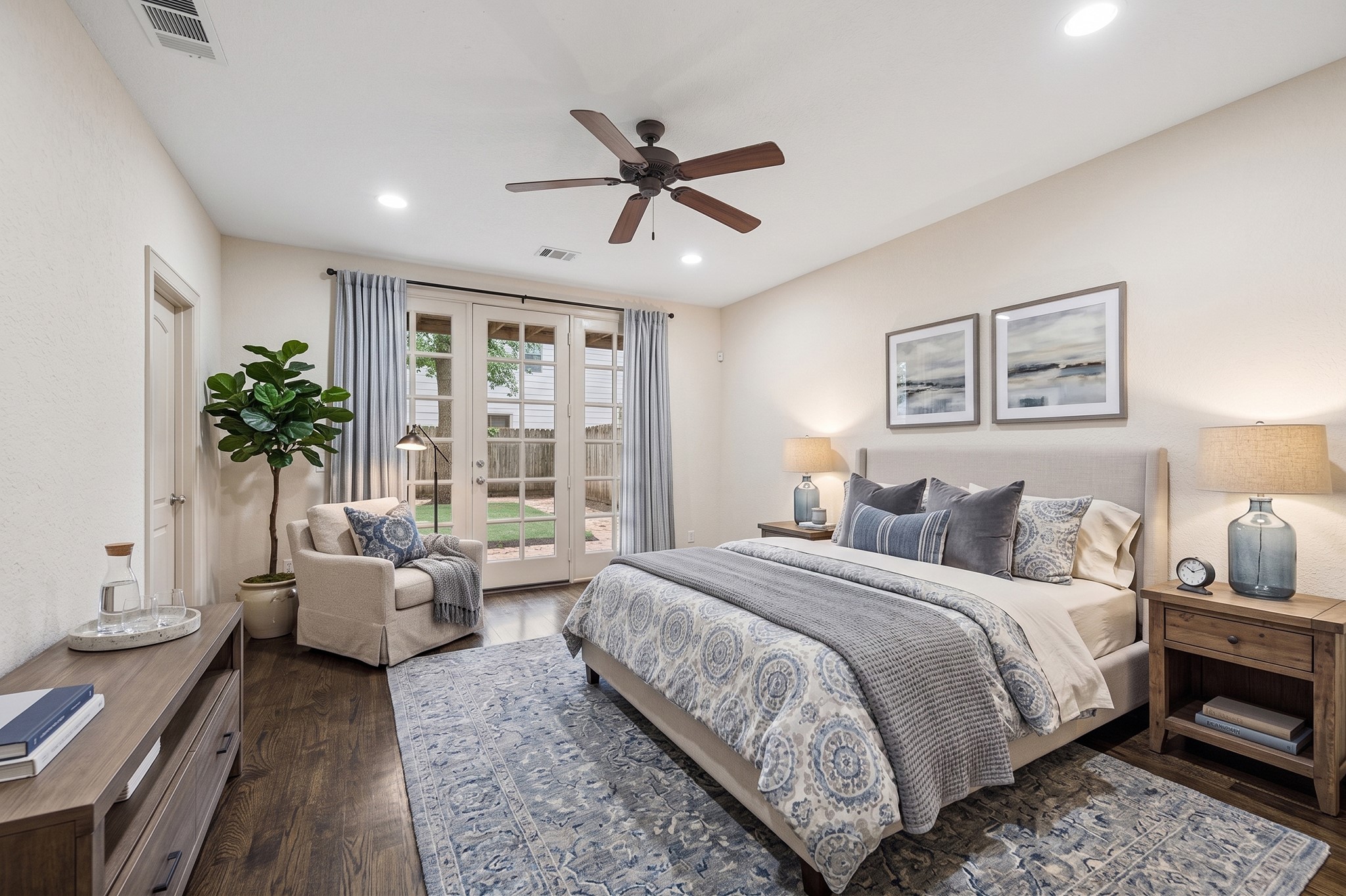 4301 Gibson Street Houston, TX 77007 - Photo 3 of 24 Virtually furnished. First floor bedroom features an ensuite full bathroom and French doors leading to covered patio and large backyard.