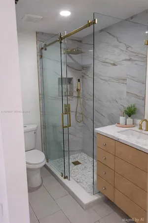 a bathroom with a shower sink and toilet