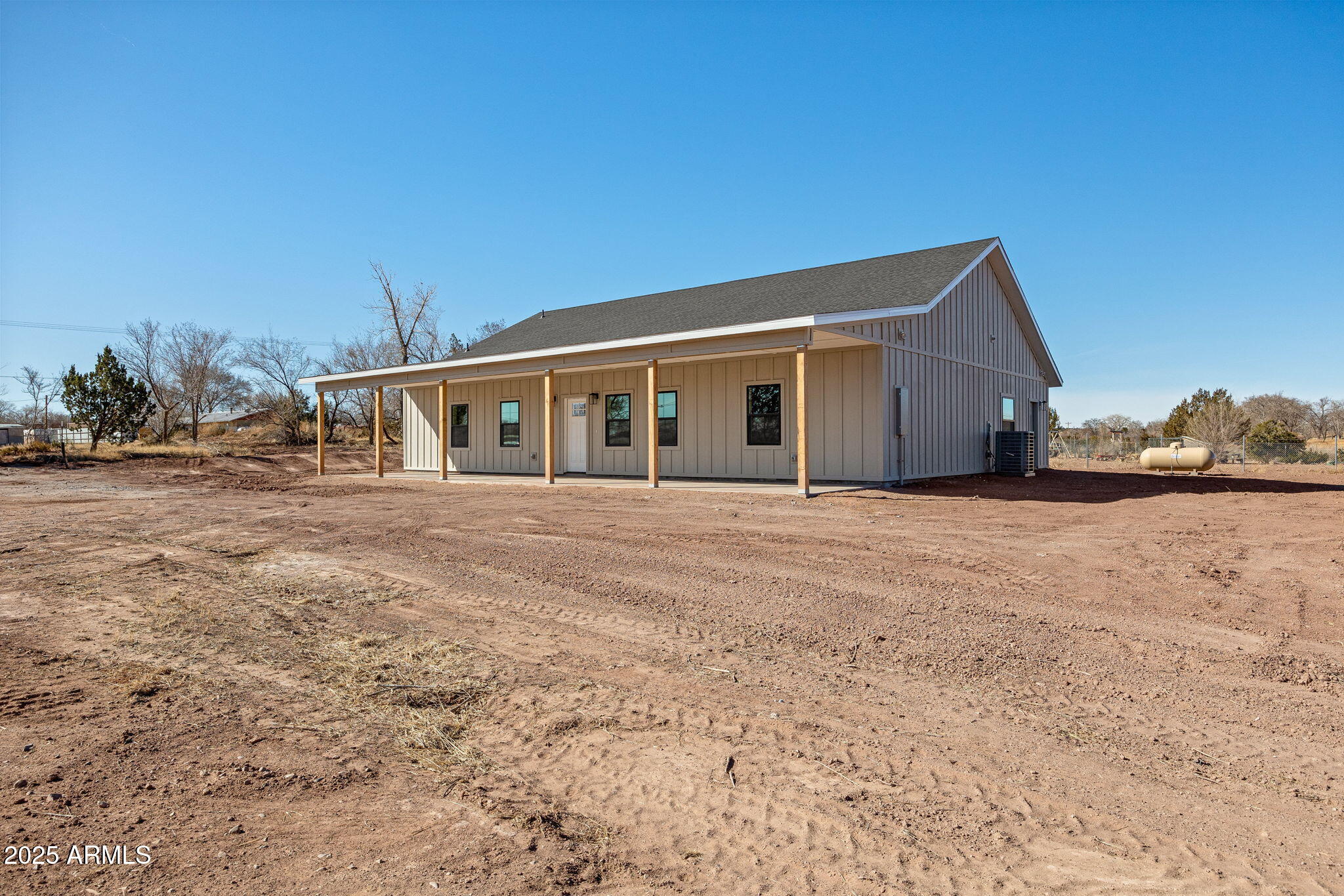 855 10th South St. Johns, AZ 85936 - Photo 8 of 41 a view of a house with a yard