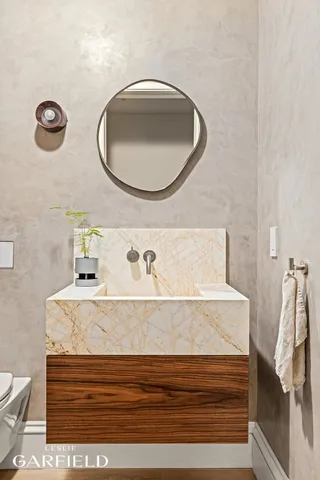 a bathroom with a sink and a mirror