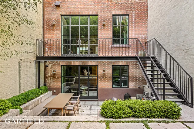 a view of yard with seating area