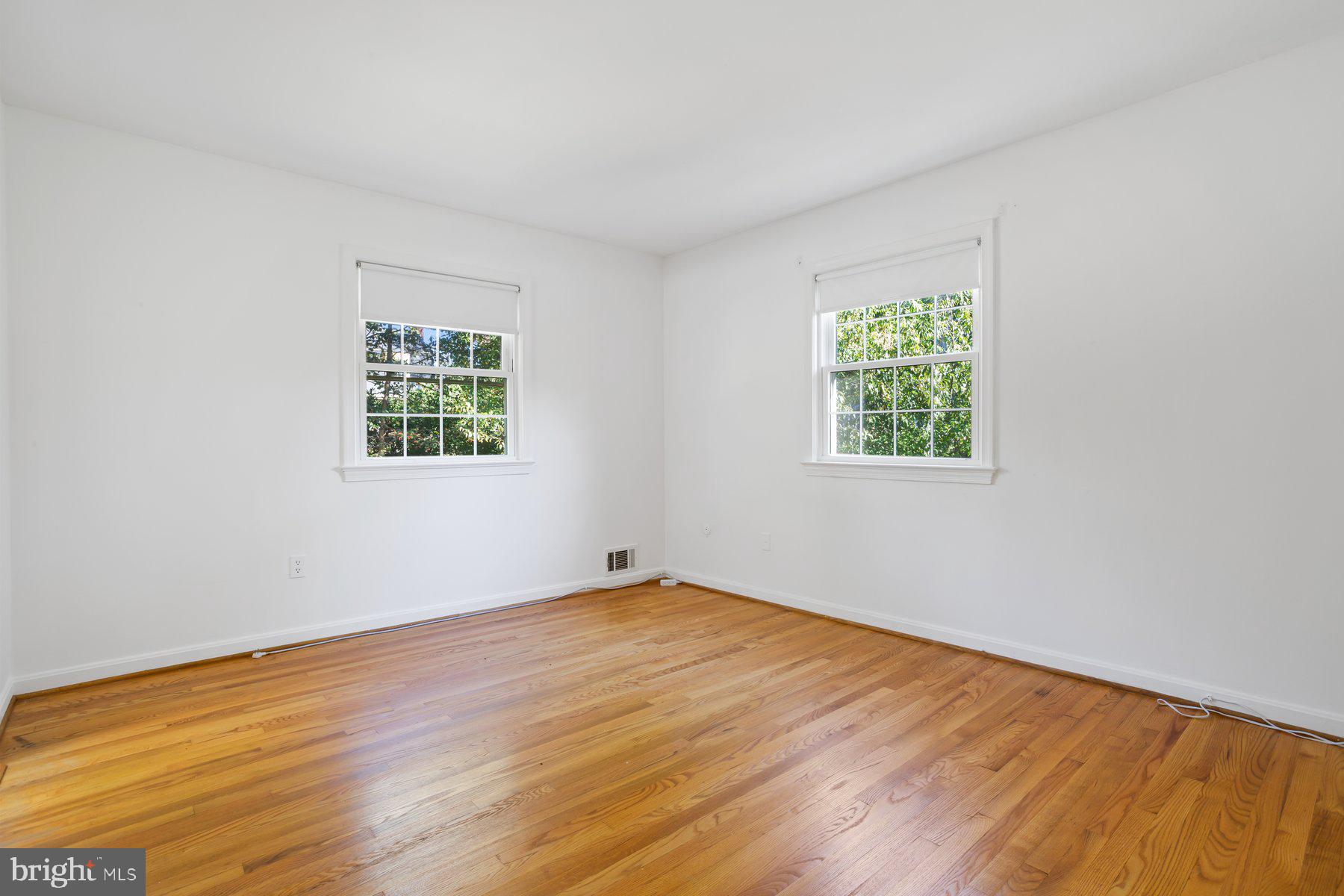 1242 Derbyshire Road Potomac, MD 20854 - Photo 26 of 40 an empty room with a window