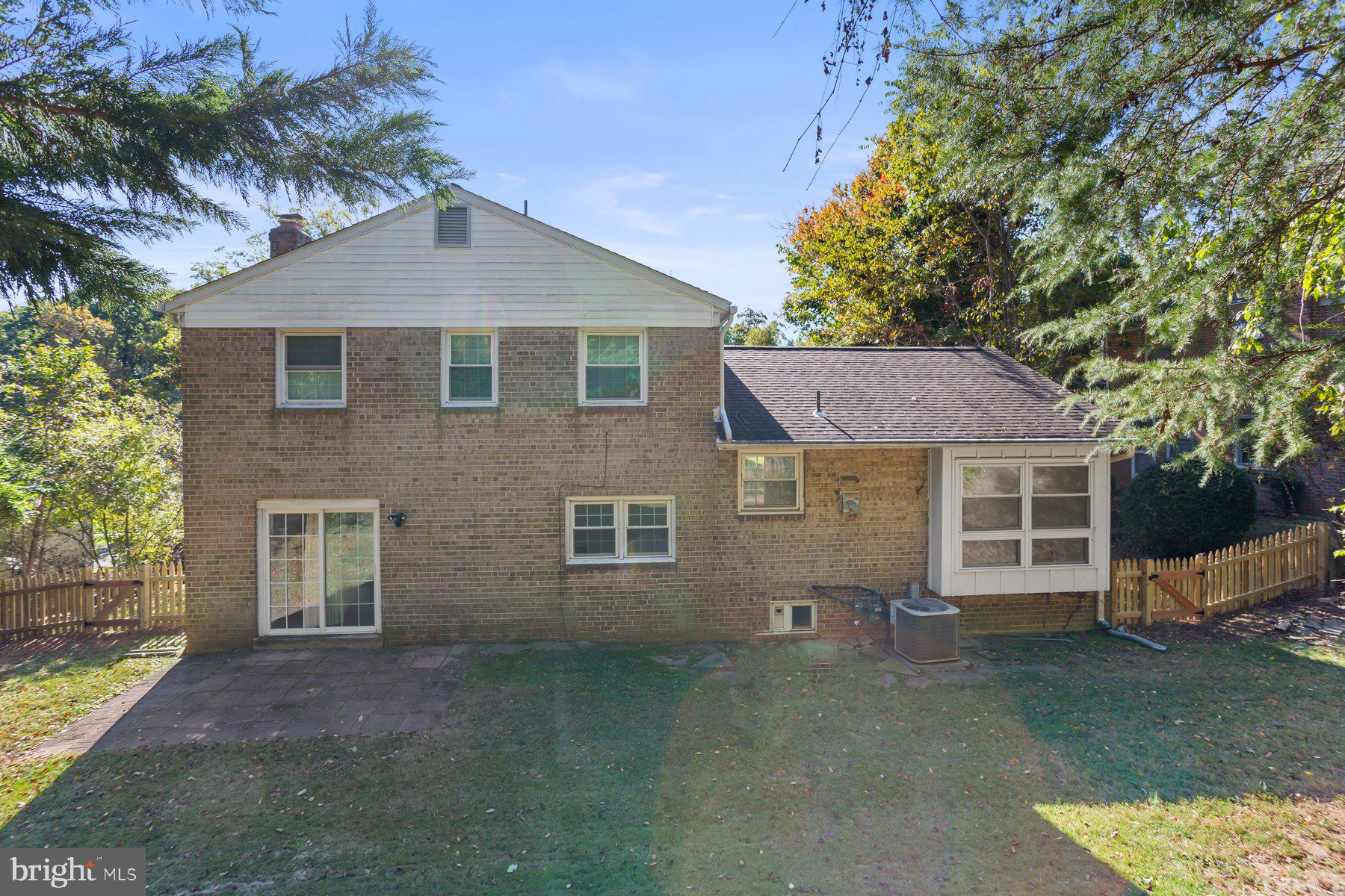 1242 Derbyshire Road Potomac, MD 20854 - Photo 37 of 40 front view of a house with a yard