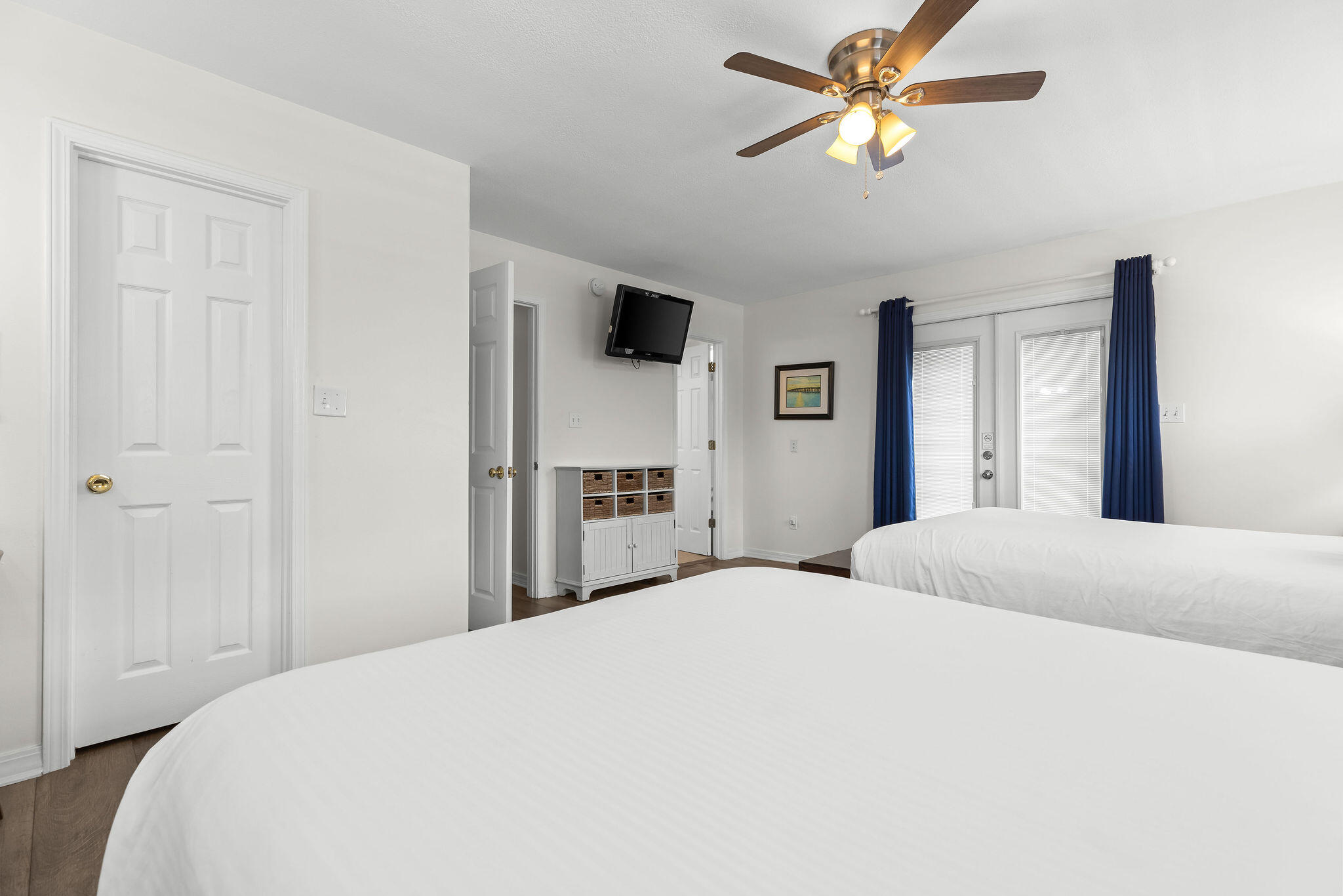 91 Matthew Boulevard Destin, FL 32541 - Photo 68 of 85 a bedroom with a bed and a chandelier