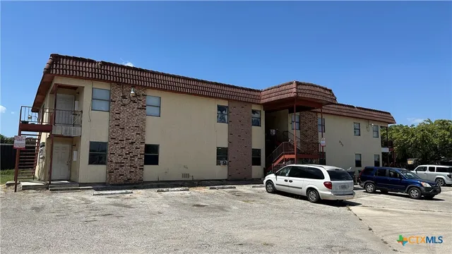 a car parked in front of a house