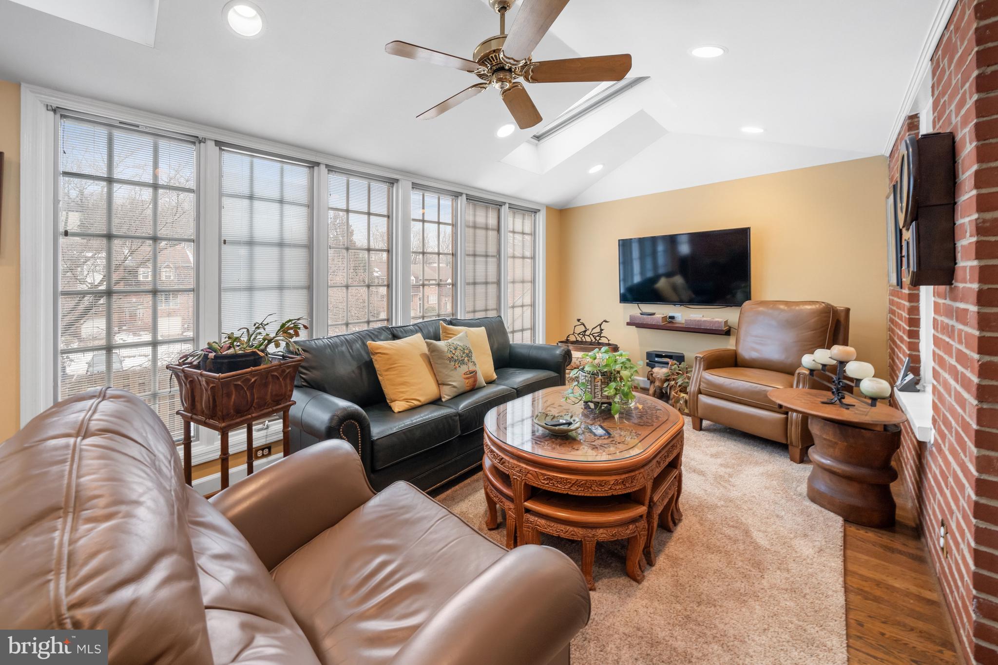 55 Ivy Road Wilmington, DE 19806 - Photo 11 of 38 a living room with furniture and a flat screen tv