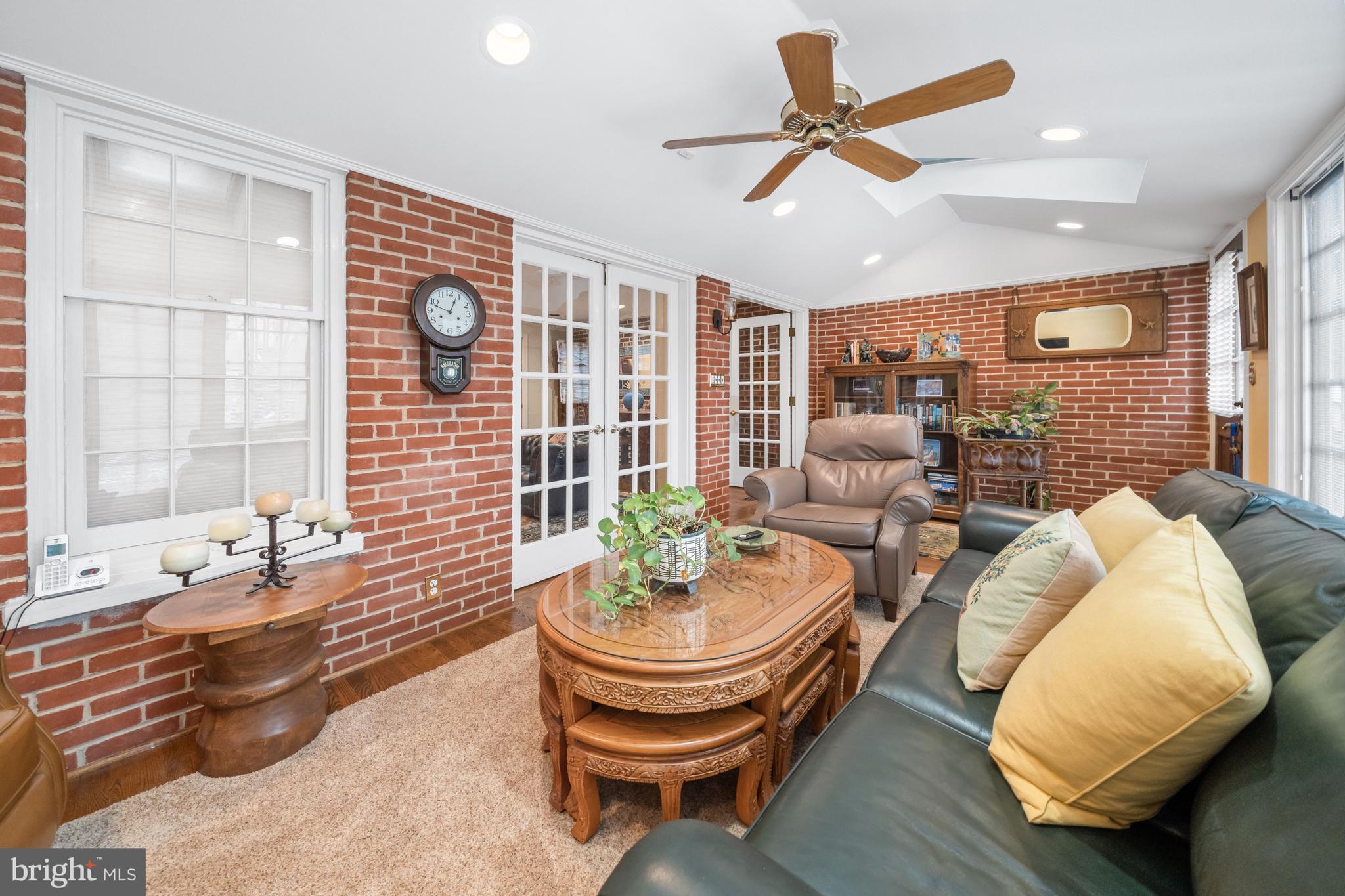 55 Ivy Road Wilmington, DE 19806 - Photo 12 of 38 a living room with furniture and a large window