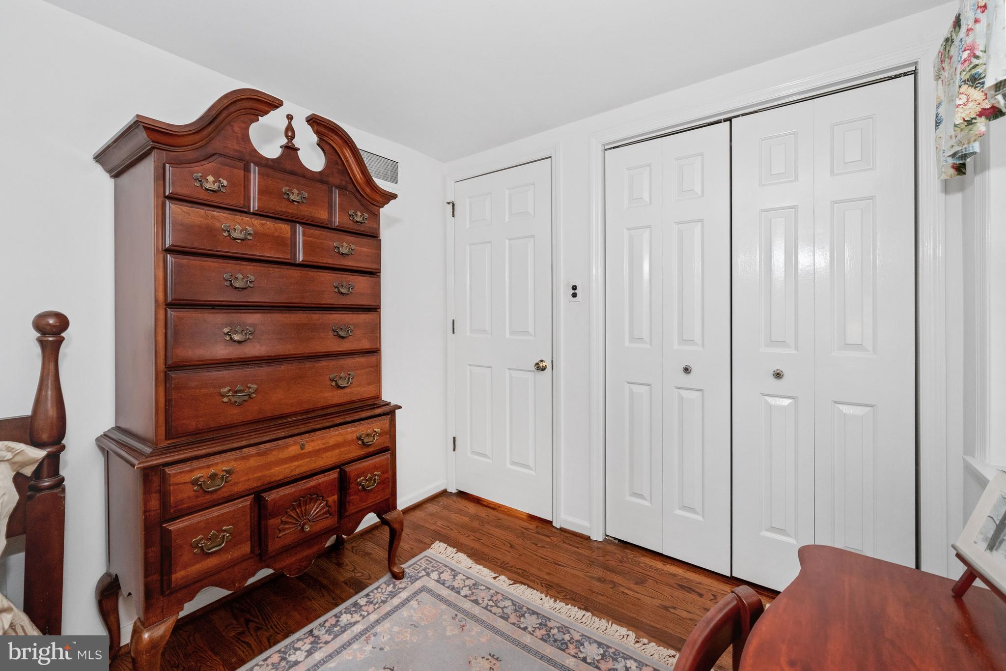 55 Ivy Road Wilmington, DE 19806 - Photo 26 of 38 a view of bedroom with furniture and wooden floor